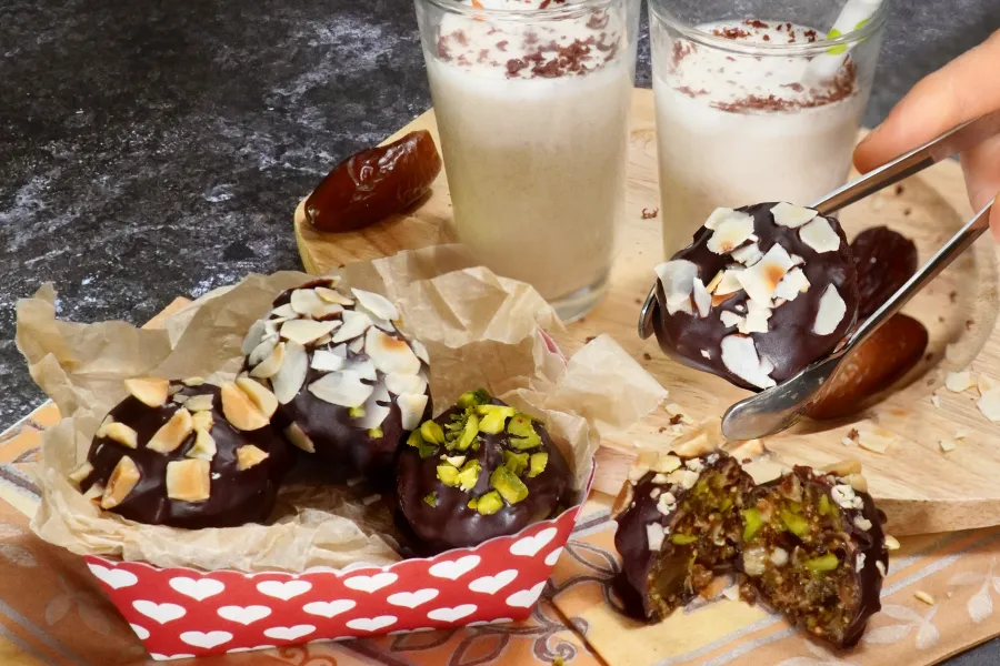 Chocolate fruit pralines and date drink